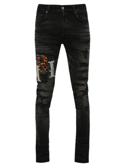 AMIRI STAGGERED LOGO JEANS BLACK