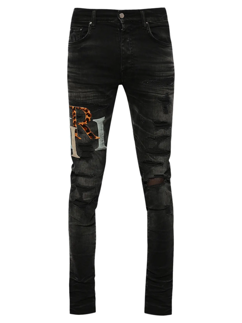 AMIRI STAGGERED LOGO JEANS BLACK
